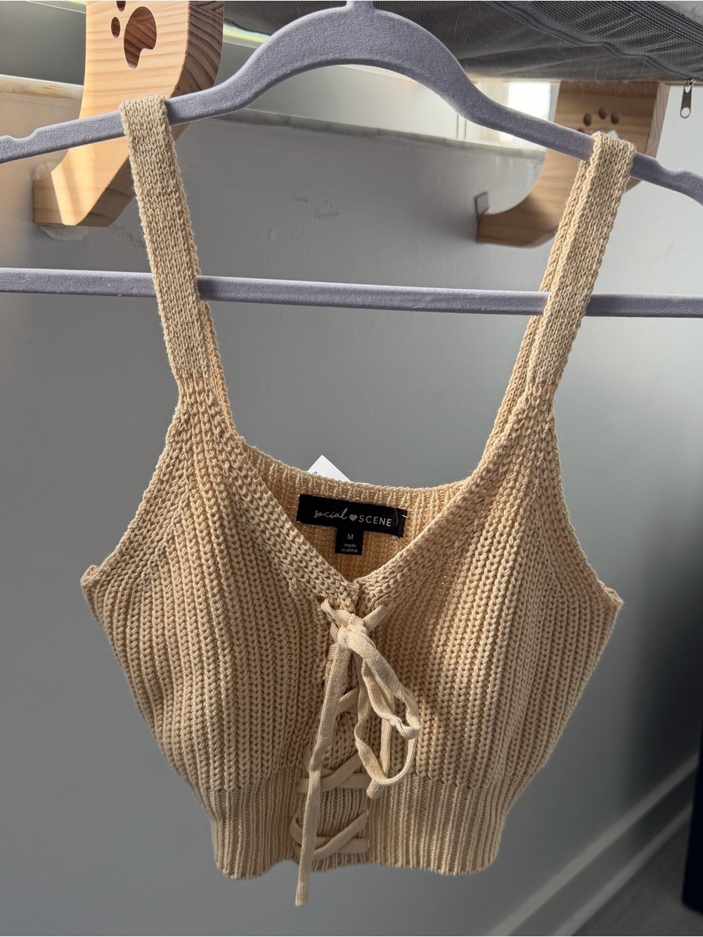 Cream knit crop top with lace up detail
